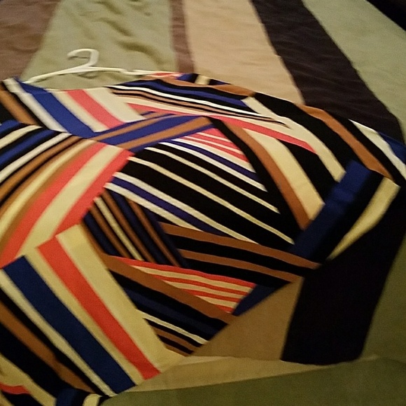 2 asymmetrical sleeve mini dresses - Picture 2 of 5